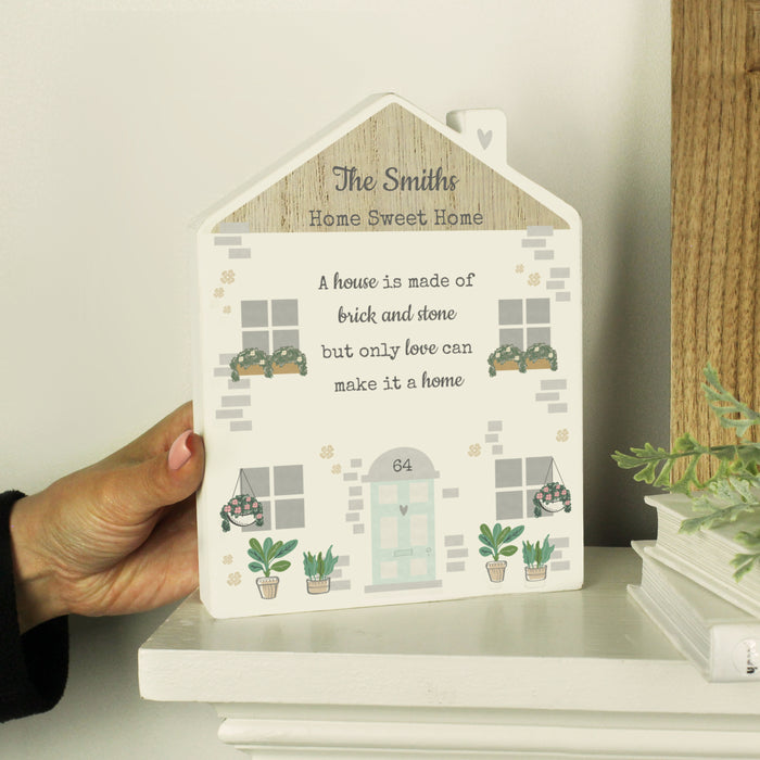 Personalised Love Makes A Home Wooden House Ornament